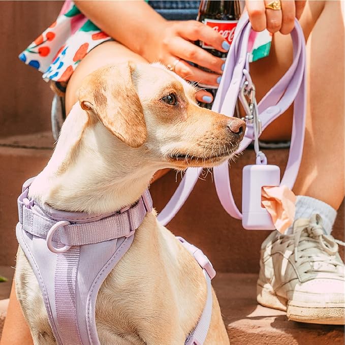 Wild One Dog Poop Bag Holder and Dispenser with Leash Attachment, Leak Proof, Easy Twist Top for Refills, Includes 1 Roll Poop Bags, Lilac