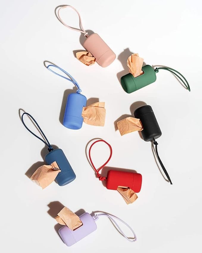 Wild One Dog Poop Bag Holder and Dispenser with Leash Attachment, Leak Proof, Easy Twist Top for Refills, Includes 1 Box Poop Bags, Lilac