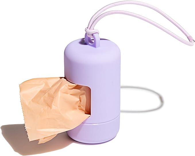 Wild One Dog Poop Bag Holder and Dispenser with Leash Attachment, Leak Proof, Easy Twist Top for Refills, Includes 1 Roll Poop Bags, Lilac